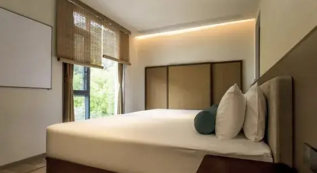 Семейный люкс с 3 комнатами с видом на сад Jingdezhen Baolaixi Resort Hotel (Sanbao International Ceramic Art Village Store)