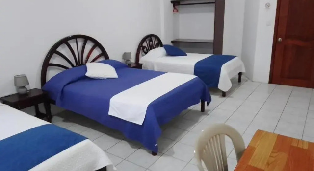 Кровать в общем номере La Isla Del Descanso