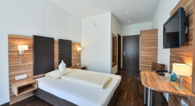 Conforto quarto Hotel Renner