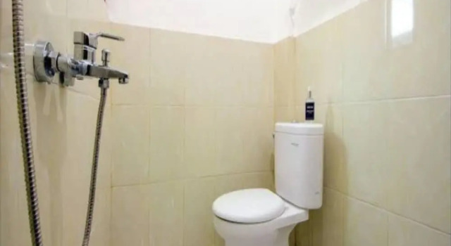 Номер Deluxe SPOT ON 2107 Ijo Pupus Syariah Residence