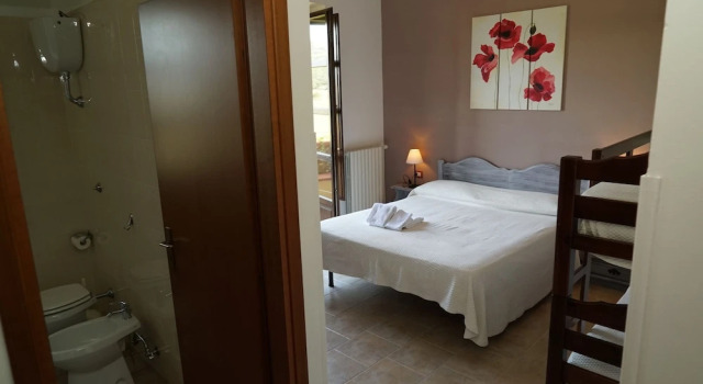 Четырёхместный номер Comfort с балконом Agriturismo La Petrosa