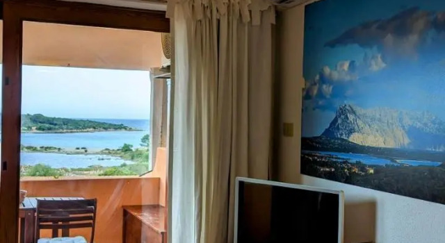 Porto Coda Cavallo Apartaments, Забронировать Отель Капо-Кода-Кавалло Сан Теодоро, рядом с Пляж Кала Брандинчи