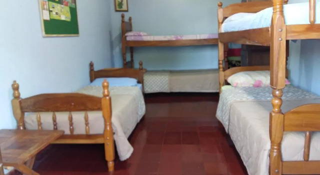 Кровать в общем номере Hummingbird Hostel