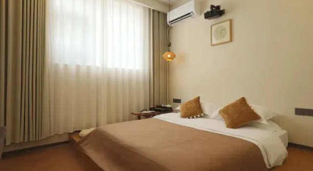 Люкс Kaifeng Moran Homestay (Wansui Mountain Da Song Wuxia City)