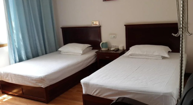 Yuanlai Inn, Prenota Hotel Enshi Prefecture Cina
