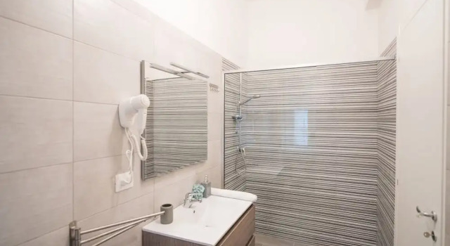 Komfort- tredobbelt værelse med altan Panta Rei B&B