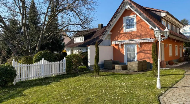 Коттедж Landhaus Laugele Ferienwohnungen