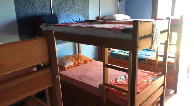 Кровать в общем номере Magia do Mar Hostel