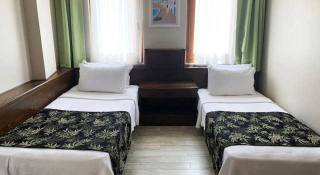 Четырёхместный номер Deluxe Mitos Hotel