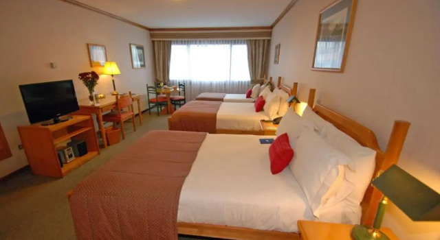 Трёхместный номер Standard abba Presidente Suites Puerto Montt