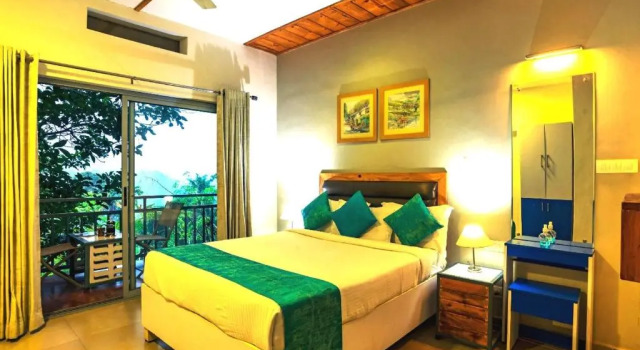 Полулюкс Mistletoe Munnar Homestay & Cafe