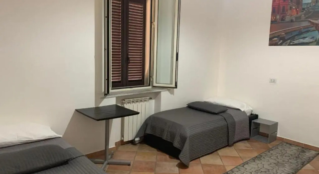 Кровать в общем номере Zidan Guest House