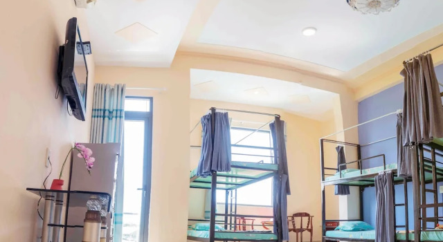 Кровать в общем номере Orchid Garden Homestay Can Tho
