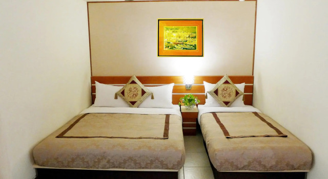 Трёхместный номер Standard Hua Guo Hotel