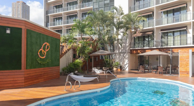 Кровать в общем номере Polynesian Residences Waikiki Beach