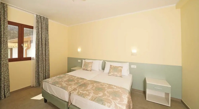 Residence Dany appartamenti con cucina vista lago piscina e parcheggio, Забронировать Гостевой дом Гостевые дома Гарньяно, Гостевой дом