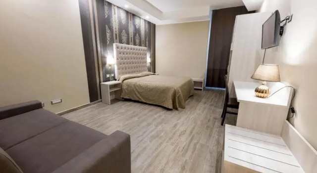 Четырёхместный номер Standard Hotel Anfiteatro Flavio