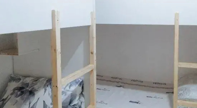 Кровать в общем номере RedDoorz at Rachael Pension House