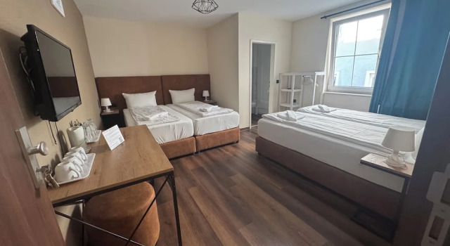 Standard quadruple chambre Hotel Capitol Zentrum - 24h