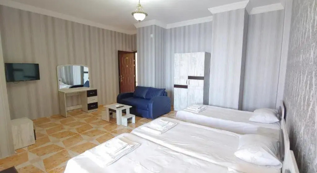 Четырёхместный номер Comfort с балконом и с красивым видом из окна Hotel kvariati Nugo