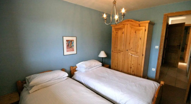 Кровать в общем номере с 6 комнатами Chalet The Loft