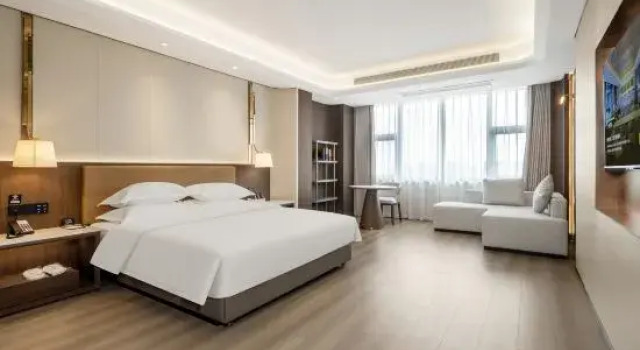 Люкс Deluxe Yuehua Jinpu International Hotel (Pubei Aoyuan Plaza)