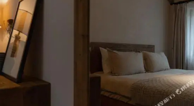 Кровать в общем номере Chongqing Yunshan B & B