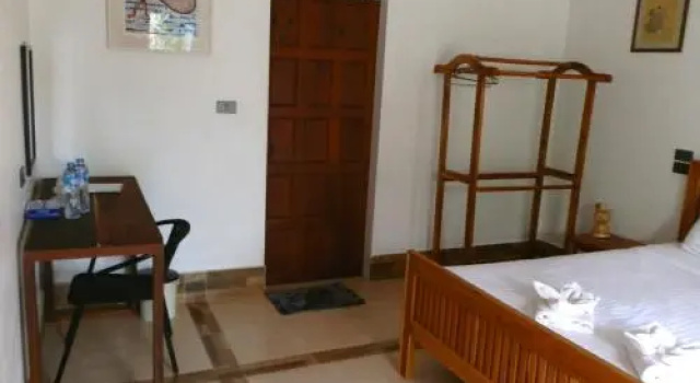 Nakorn Cafe Guest House, Rezerwuj Pensjonat Champasak Laos
