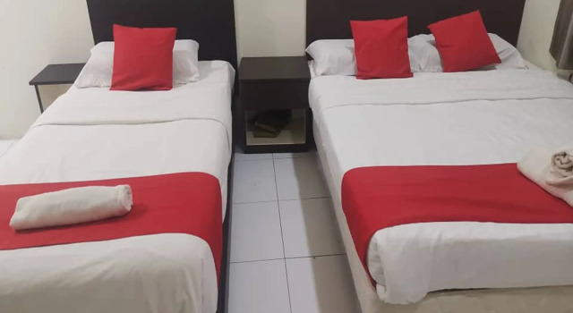 Люкс OYO 1104 Q Hotel