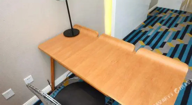 Кровать в общем номере Moore Harbor Fashion Hotel