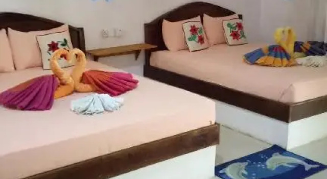 Кровать в общем номере Sigiri Sara Home Stay Nice Village