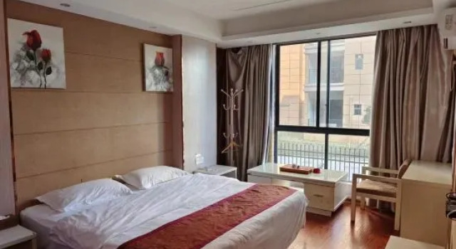 Трёхместный люкс Deluxe May Flower Fashion Hotel