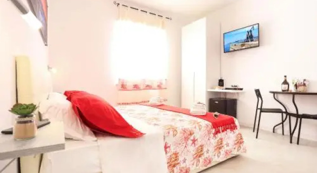 Rosso di Mare Guest House Alghero, Забронировать Отель Альгеро Sardinia North, рядом с Torre di Porta Terra