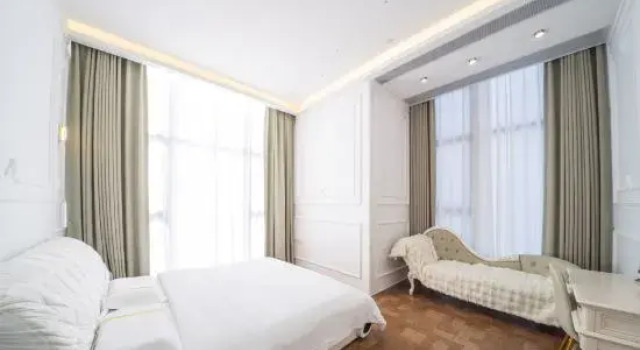 Люкс с 3 комнатами HaiGe Apartment (Zhanjiang Wanda Rongsheng Plaza)