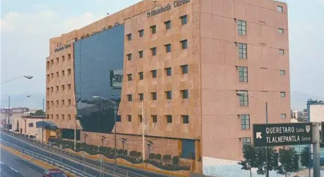 Кровать в общем номере Hotel Mandarin Carton