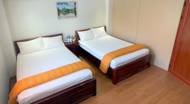 Четырёхместный номер Superior с балконом и с видом на озеро Minh Đức Green Hotel Tuần Châu