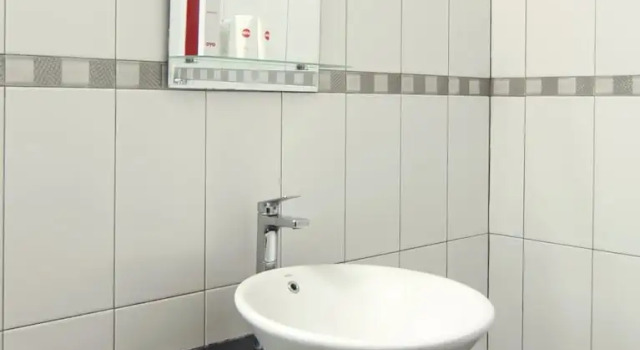 Номер Deluxe OYO 882 Puri Gevana Guest House