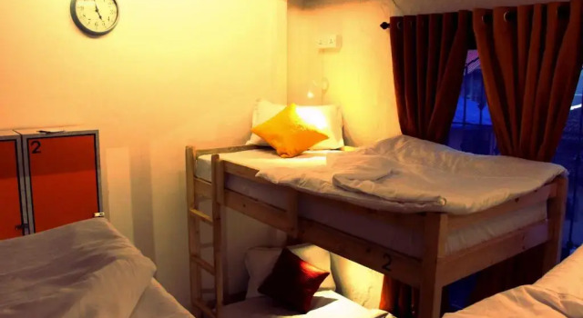 Кровать в общем номере Cohostel