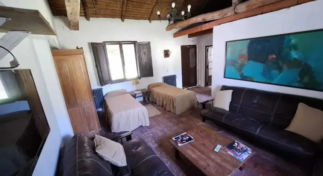 Кровать в общем номере Estancia Las Tacanas