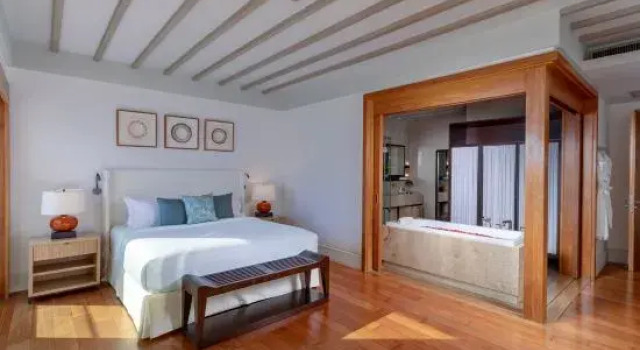 Кровать в общем номере с 6 комнатами Villa Amankara