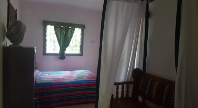 Кровать в общем номере La Casa de Don David
