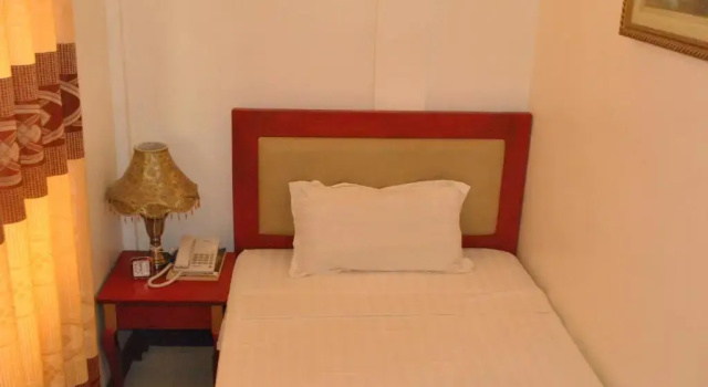 Standard Single quarto Dragon Home Inn
