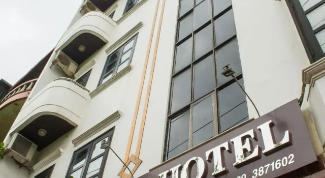 Кровать в общем номере Thuy Anh Hotel