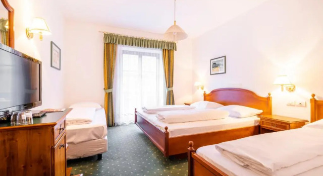Четырёхместный номер Standard с балконом Hotel Restaurant Putzer