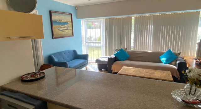 Cozy two bedroom unit in Strand with pool gym and laundromat