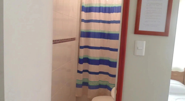 Standard- tredobbelt værelse Hostal Arrayan