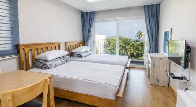 Коттедж Jeju Bada Wi Olle Pension
