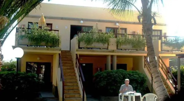 Кровать в общем номере Bungalows Maspalomas Oasis Club - All Inclusive