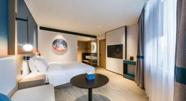 Люкс Ni Hao Hotel (Nantong Railway Station Xingfu Subway Station)
