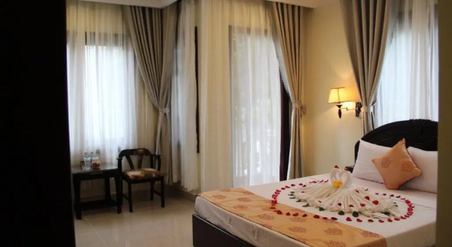 Четырёхместный номер Standard с видом на бассейн GM Doc Let Beach Resort & Spa